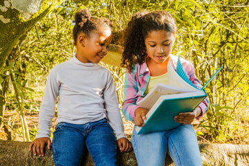 How does reading help develop a child's language and communication skills